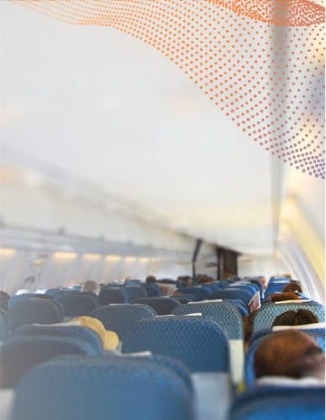 People sitting inside an airplane.