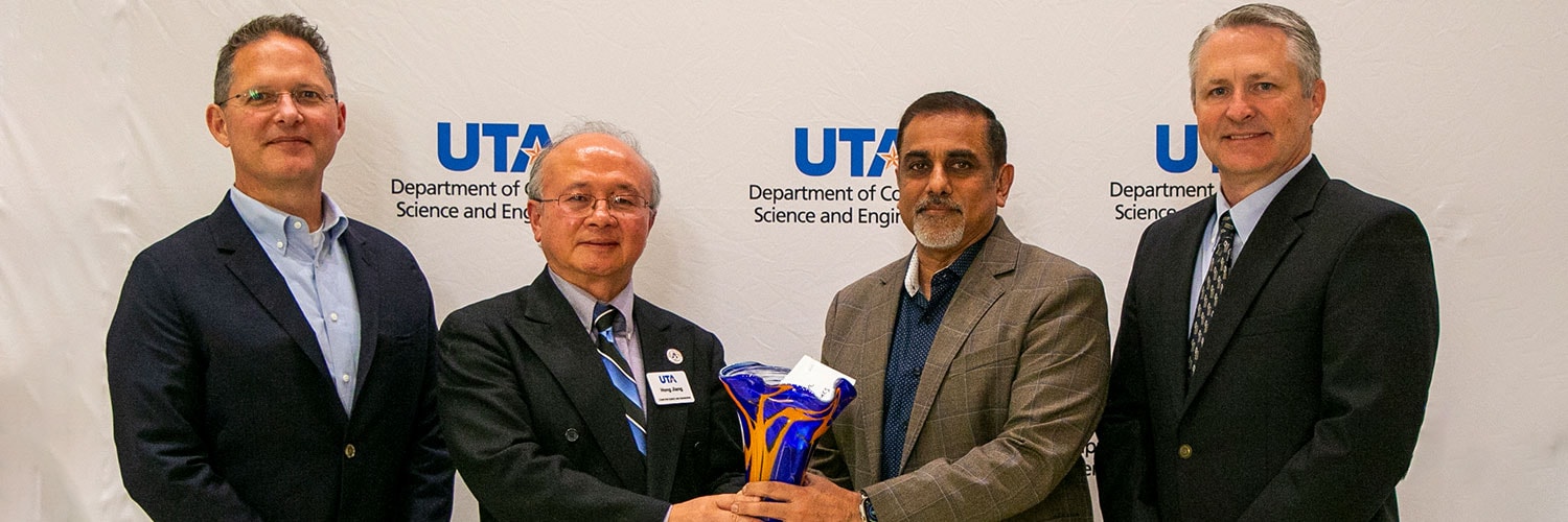 Award presentation photo with Hayne Shumate, Dr. Hong Jiang, Raju Shah, and Jeff Feemster